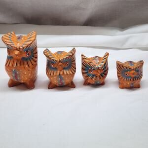 Set of 4 hand painted wooden owls. 1 eye needs repainting